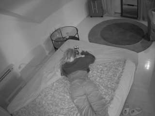 voyeurcam-julmodels-whitebed-4 webcam model stream image