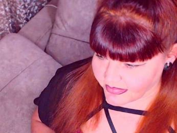 RedBustyX webcam model stream image